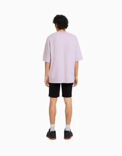 BERSHKA Bermuda denim skinny retroussé Bleu Store