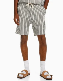 BERSHKA Bermuda jogger rustique rayures Blanc / Noir Shop