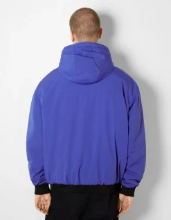 BERSHKA Blouson matelassé capuche imprimé Bleu Fashion