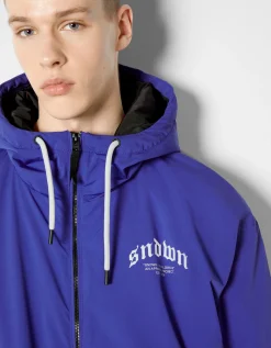 BERSHKA Blouson matelassé capuche imprimé Bleu Fashion