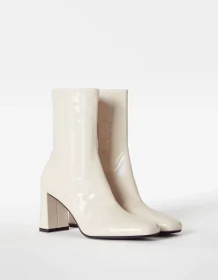 BERSHKA Bottines à talon moulantes vernies Écru New