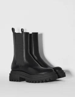BERSHKA Bottines plates avec bandes élastiques Noir Store