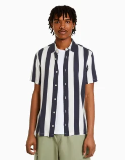 BERSHKA Chemise manches courtes serge rayures Blanc / Noir Discount
