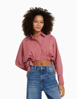 BERSHKA Chemise manches longues cropped avec lanières Rose Discount
