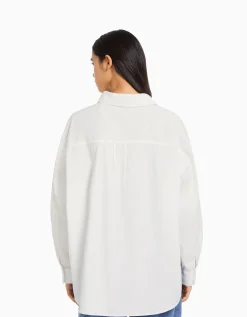 BERSHKA Chemise manches longues oversize popeline Beige Store
