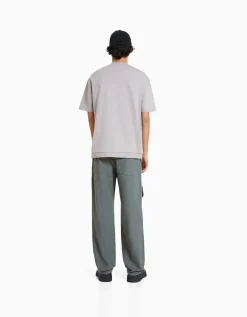 BERSHKA Jean cargo multipoches Bleu Outlet