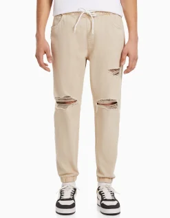 BERSHKA Jean jogger coloré déchirures Blanc Shop