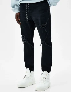BERSHKA Jean jogger déchiré Bleu Hot