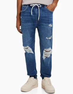 BERSHKA Jean jogger déchiré Bleu Best Sale