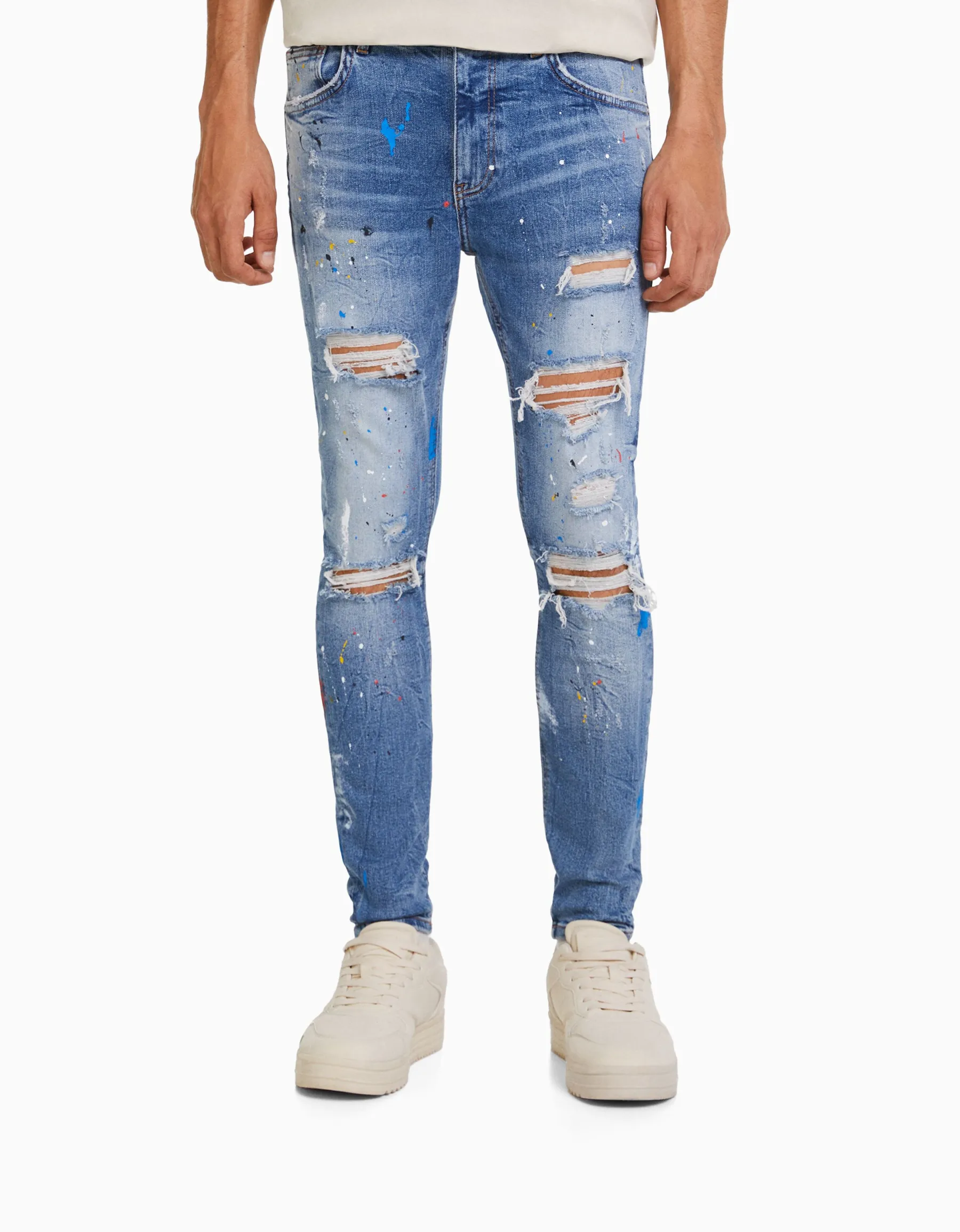 BERSHKA Jean skinny déchirures taches de peinture Bleu lavé Flash Sale