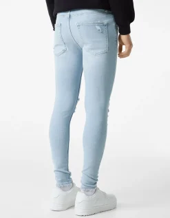 BERSHKA Jeans super skinny déchirés Bleu lavé Store