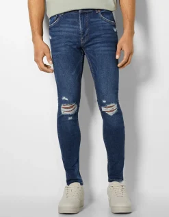 BERSHKA Jeans super skinny déchirés Bleu Store