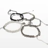 BERSHKA Lot 5 bracelets croix Noir Outlet