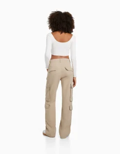 BERSHKA Pantalon cargo moulant serge multipoches Camel Store