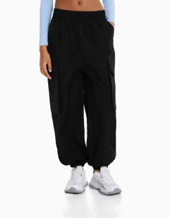 BERSHKA Pantalon jogger cargo poches effet nylon Gris Best Sale