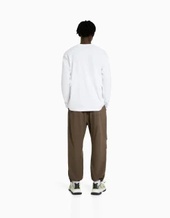 BERSHKA Pantalon jogger parachute technique Noir Hot