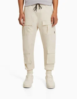 BERSHKA Pantalon jogger technique multifonction Sable Outlet