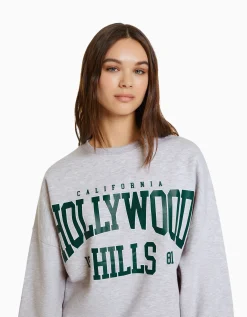 BERSHKA Sweat ample imprimé Bleu clair Store