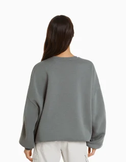 BERSHKA Sweat ample imprimé Bleu clair Clearance