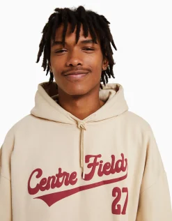 BERSHKA Sweat capuche varsity Camel New