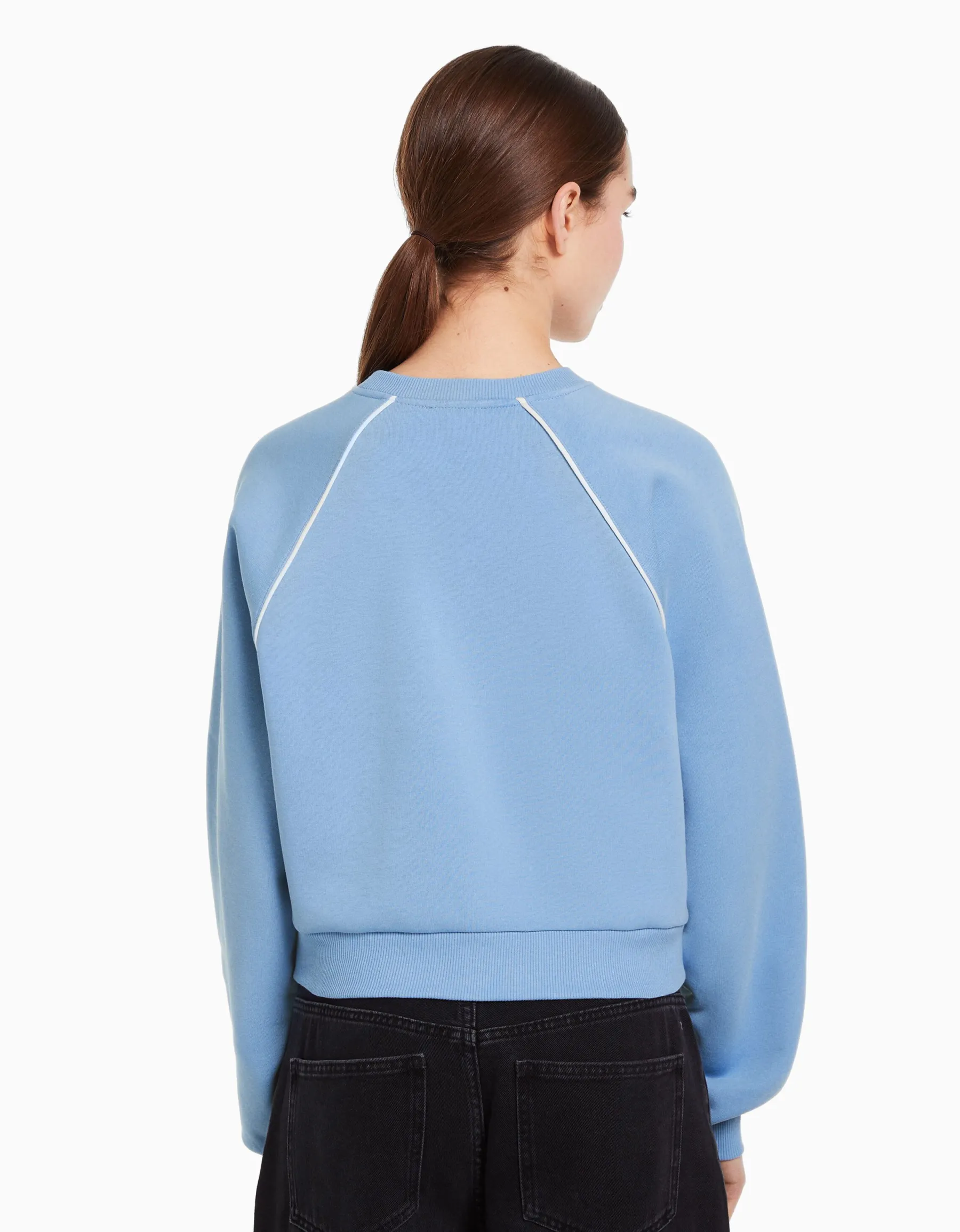 BERSHKA Sweat col rond imprimé contraste Bleu Hot