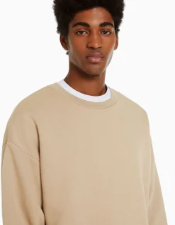 BERSHKA Sweat oversize col rond Noir Hot