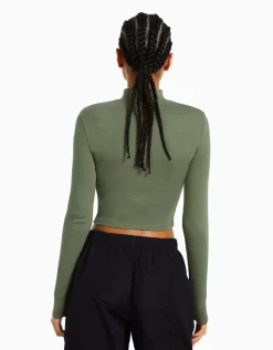 BERSHKA Top col montant manches longues Blanc cassé Store