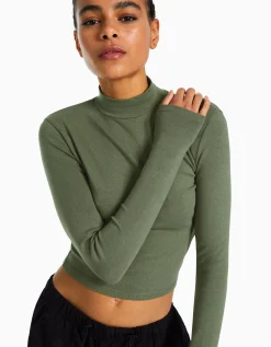 BERSHKA Top col montant manches longues Blanc cassé Store