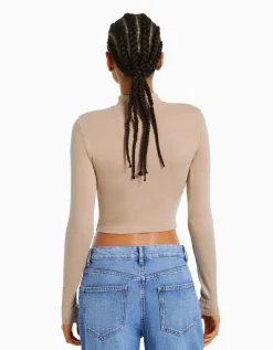 BERSHKA Top col montant manches longues Blanc cassé Shop