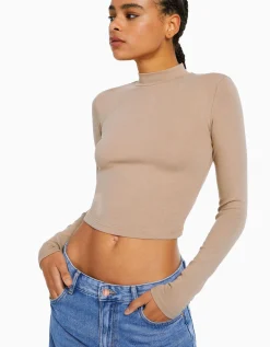 BERSHKA Top col montant manches longues Blanc cassé Shop