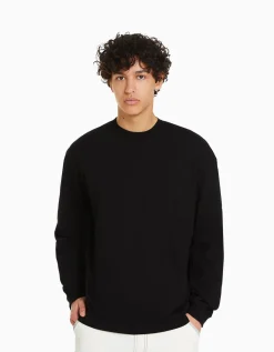 BERSHKA Top manches longues oversize imprimé Noir Outlet