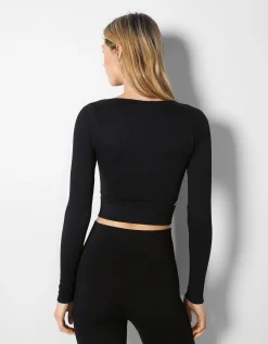 BERSHKA T-shirt manches longues seamless découpé sur le côté Noir Online